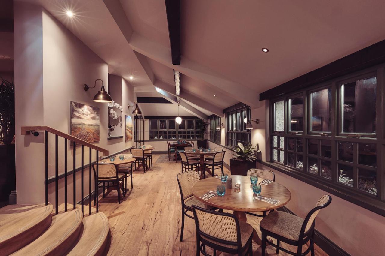 Longlands Inn & Cottages Carnforth Esterno foto The interior of the restaurant