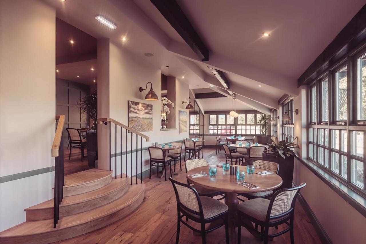 Longlands Inn & Cottages Carnforth Esterno foto The restaurant at the hotel