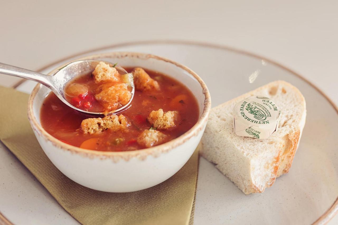 Longlands Inn & Cottages Carnforth Esterno foto A bowl of soup with a bread roll