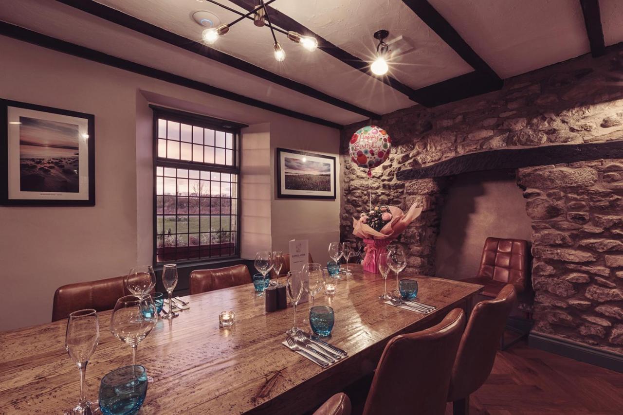 Longlands Inn & Cottages Carnforth Esterno foto The restaurant at The Old Stamp House
