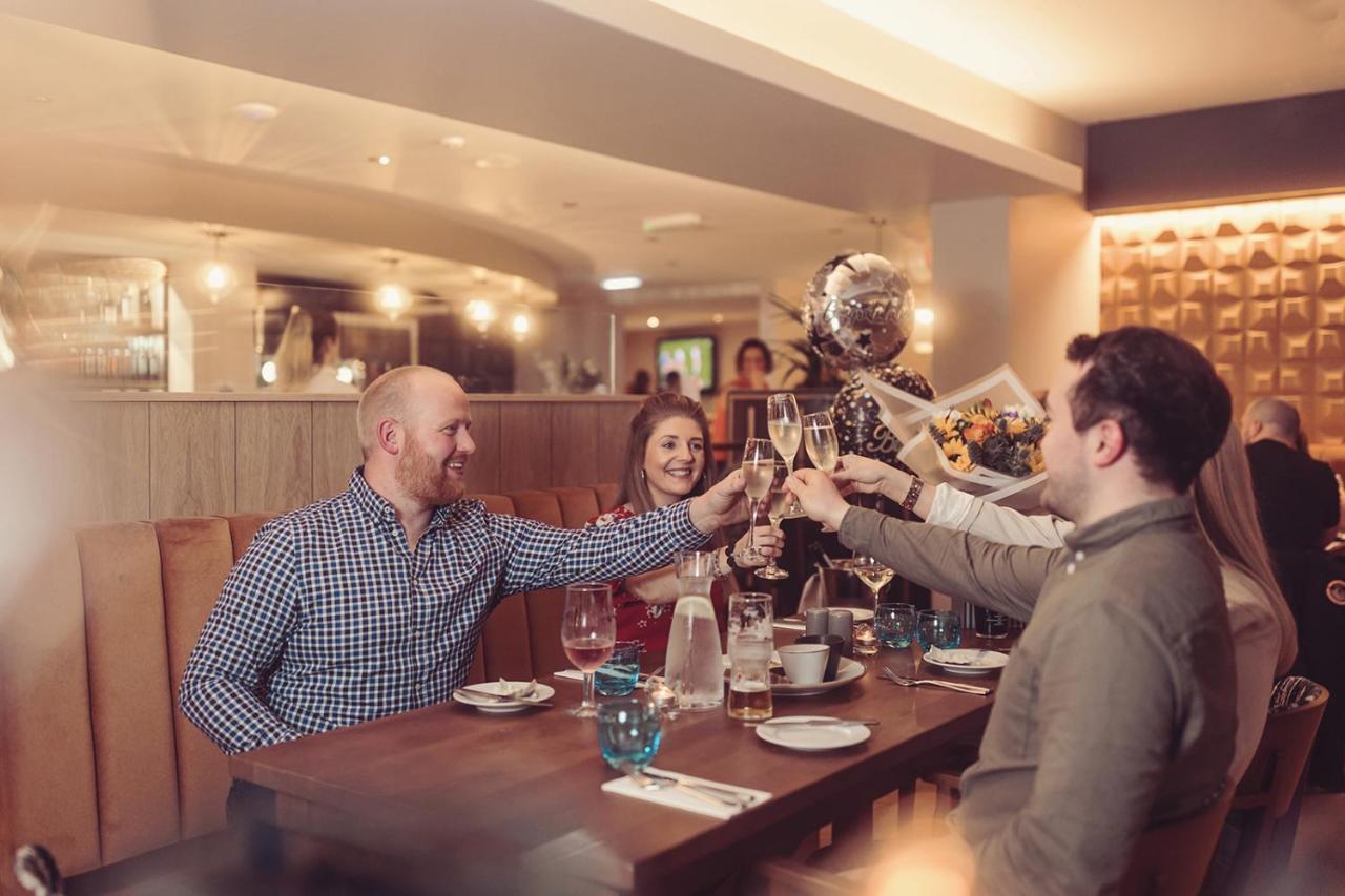 Longlands Inn & Cottages Carnforth Esterno foto The restaurant at the hotel