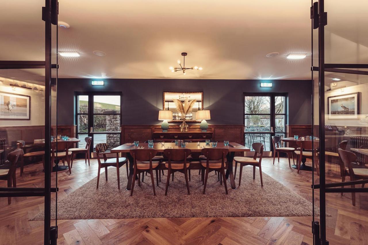 Longlands Inn & Cottages Carnforth Esterno foto The restaurant at the hotel